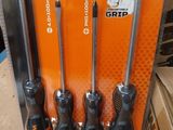 five screwdrivers in the package on the table