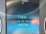 the dashboard of a car with a digital display showing the speed of a car