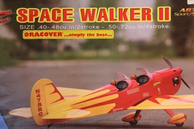a red and yellow toy airplane on the ground
