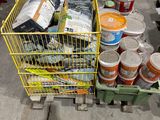 a cart full of cans and cans of food on the street