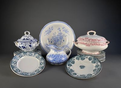 many different types of plates and bowls on the table