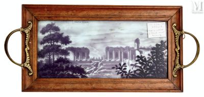 une photo d'un tableau représentant un paysage, dans un cadre en bois