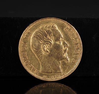 une pièce d'or représentant le profil d'une femme
