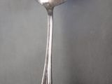 a spoon that is sitting on top of a table