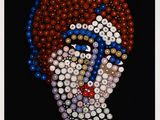 a close up of a picture of a person made out of buttons