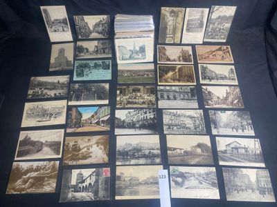 several old black and white photos of a train station and other buildings