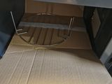 a box that has a basket inside of it