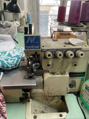a sewing machine that is sitting on a table