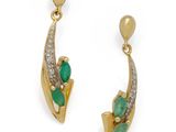 an image of a pair of gold and emerald earrings