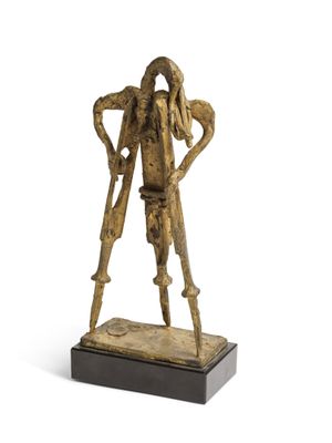 an image of a bronze statue of a woman holding a cane