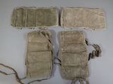 four pieces of military equipment laid out on a white surface
