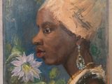 tableau représentant une femme portant un turban et tenant une fleur dans la bouche