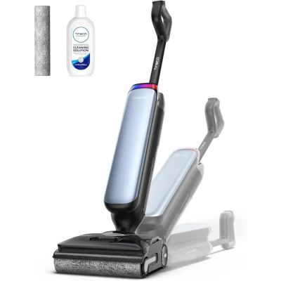 a black and white photo of a vacuum and a toothbrush