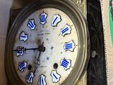 a box with a clock inside of it and a box with a clock inside of it