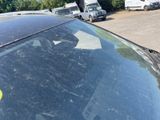 a car that has a sticker on the hood of it