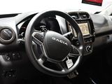the interior of a car with a steering wheel and dashboard controls