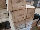 many boxes stacked on top of each other in a room