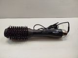 a hair dryer that is sitting on a table