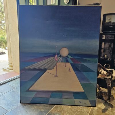 une photo d'un tableau posé par terre dans une maison