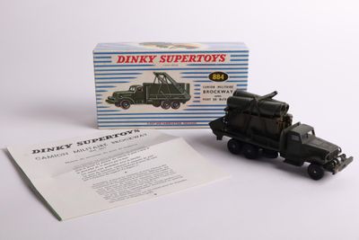 a black toy truck with a box on the back
