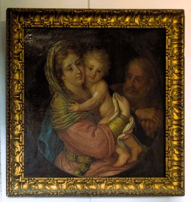 painting of a woman holding a child and a man holding a baby