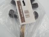 a plastic bag with a bunch of chocolate candies on it