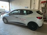a white car that is parked in a garage