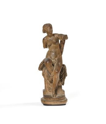 an image of a statue of a woman sitting on top of a horse