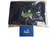 a close up of a black cloth with a picture of a town on it