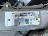 a close up of a car ' s engine with a sticker on it
