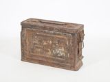 an old wooden box sitting on top of a white surface