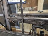 an image of a machine that is working on a piece of metal
