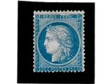 un timbre bleu et blanc sur lequel figure le visage d'une femme