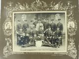 an old photo of a group of men in uniform