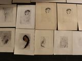 a lot of drawings on the wall of a room