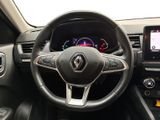 the interior of a car with a steering wheel, dashboard, and dash board