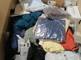 a box full of clothes and other items that are in it