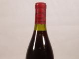 a bottle of wine that is sitting on a table