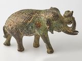statue of an elephant on a white surface with a white background