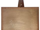 an old wooden easel with a piece of paper attached to it