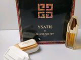 a box of perfumes and a box of soap sitting on a table