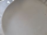 a white plate that has a black and white design on it