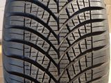 a close up of a tire on a wooden surface