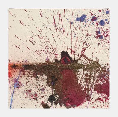 a picture of a person sitting on a bench with paint splatters on the ground