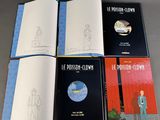 four books on a table with a drawing of a man in a suit
