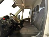 a view of the inside of a van from the driver ' s seat