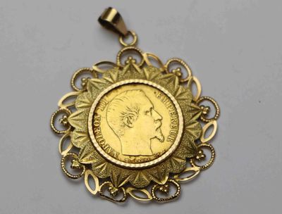 l'image d'une pièce d'or sur laquelle figure, au centre, le visage d'un homme