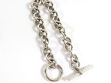 silver plated chain bracelet with a clasp on a white background