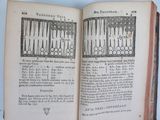 an open book with a picture of a backgam board in it