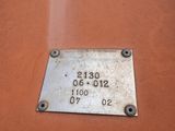 a metal plaque on the side of a building